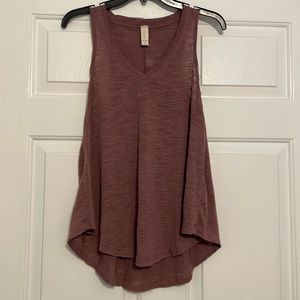 Burgundy distressed tank.